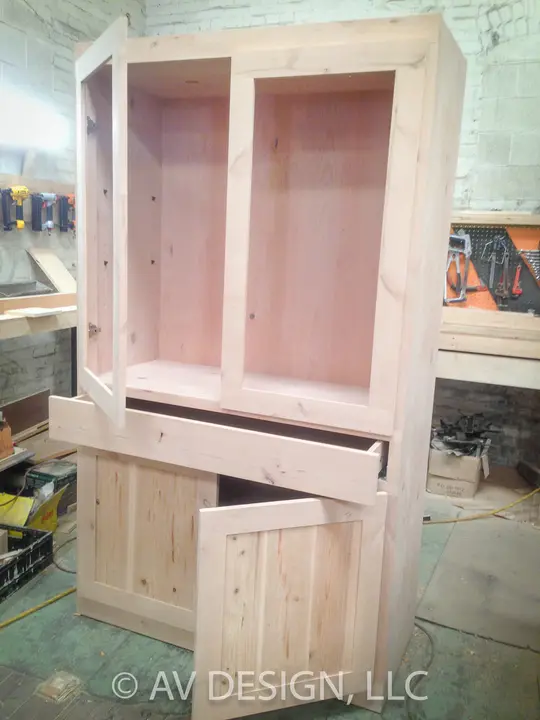 Custom pine hutch with open upper shelves, a drawer and lower cabinet doors