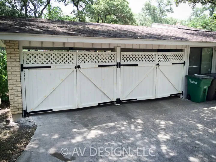 Custom white double garage gates with lattice top and black hardware