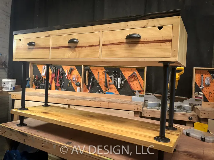 Pine drawer console with cup pulls on black pipe legs