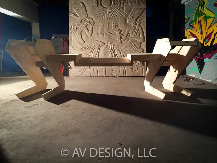Sculptural plywood lounge benches with angular legs